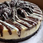 Oreo Cheesecake Recipe Dark Cookie Swirl With White Drizzle 6 Oreo Cheesecake Recipe Dark Cookie Swirl With White Drizzle 1760778095.7289355