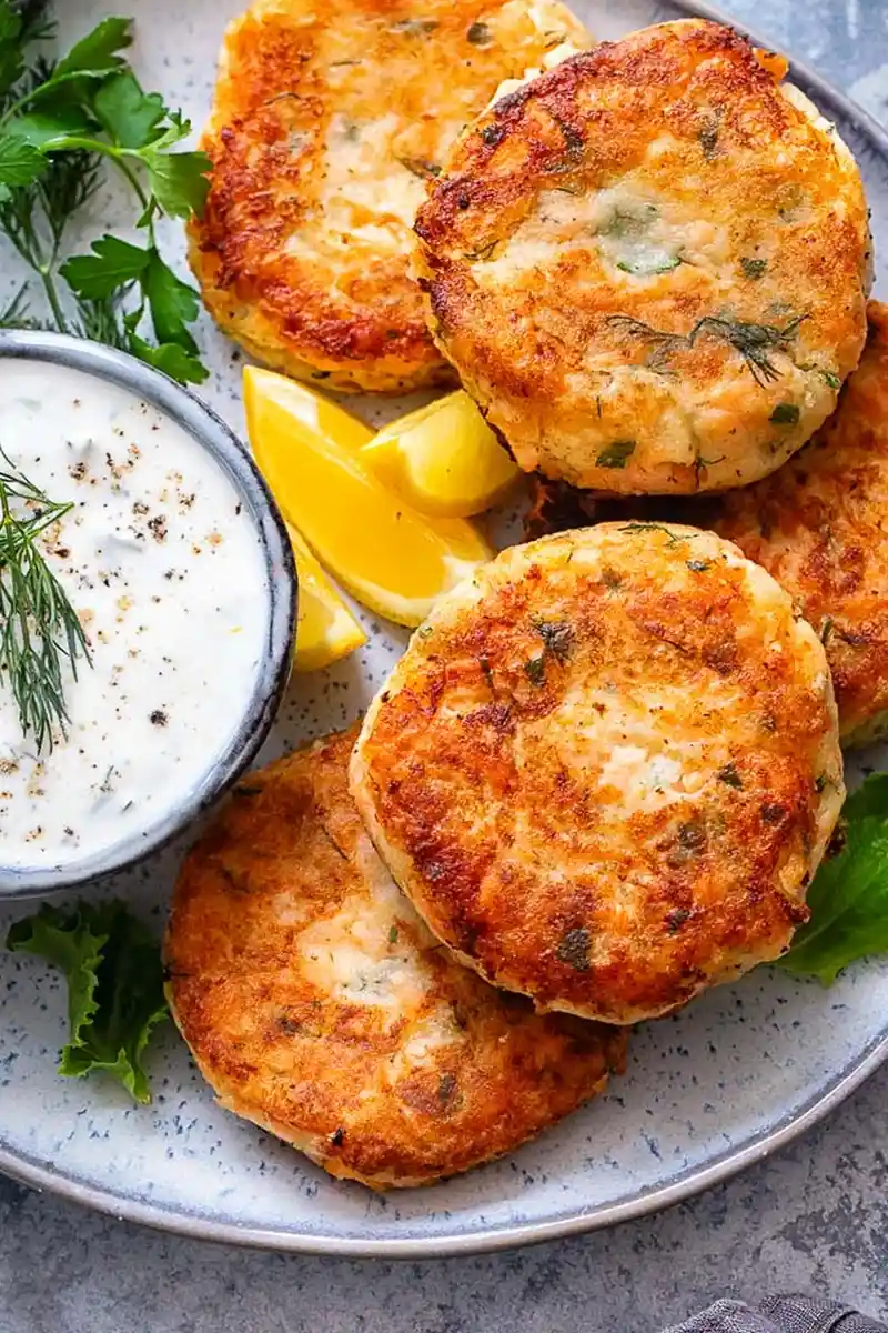 Crispy Salmon Cakes with Creamy Chive and Garlic Sauce 3 Recipe image